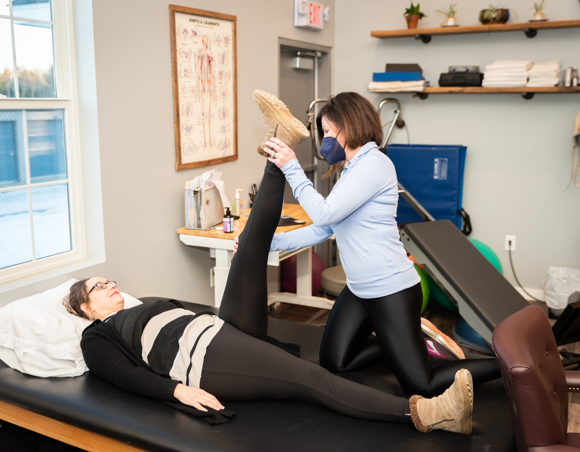 Physical Therapist Mollie, working with a client