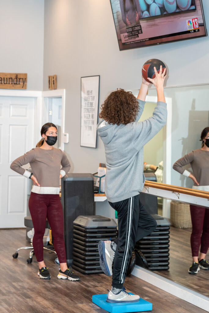 Physical Therapist, Jessica working with a client