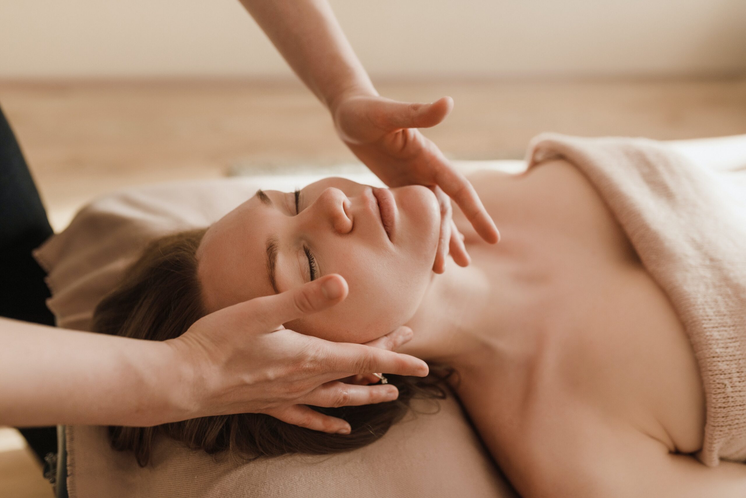 Women getting a facial massage 